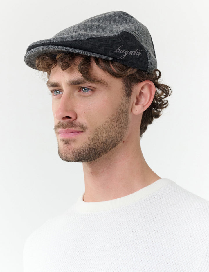 Winddichte bugatti Flatcap mit Color Block Design und Ohrenklappen