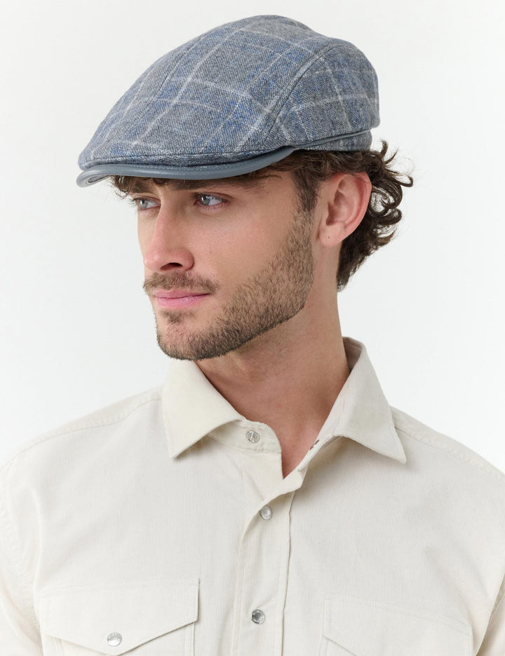 Winddichte bugatti Flatcap mit Karo-Design und Ohrenklappen