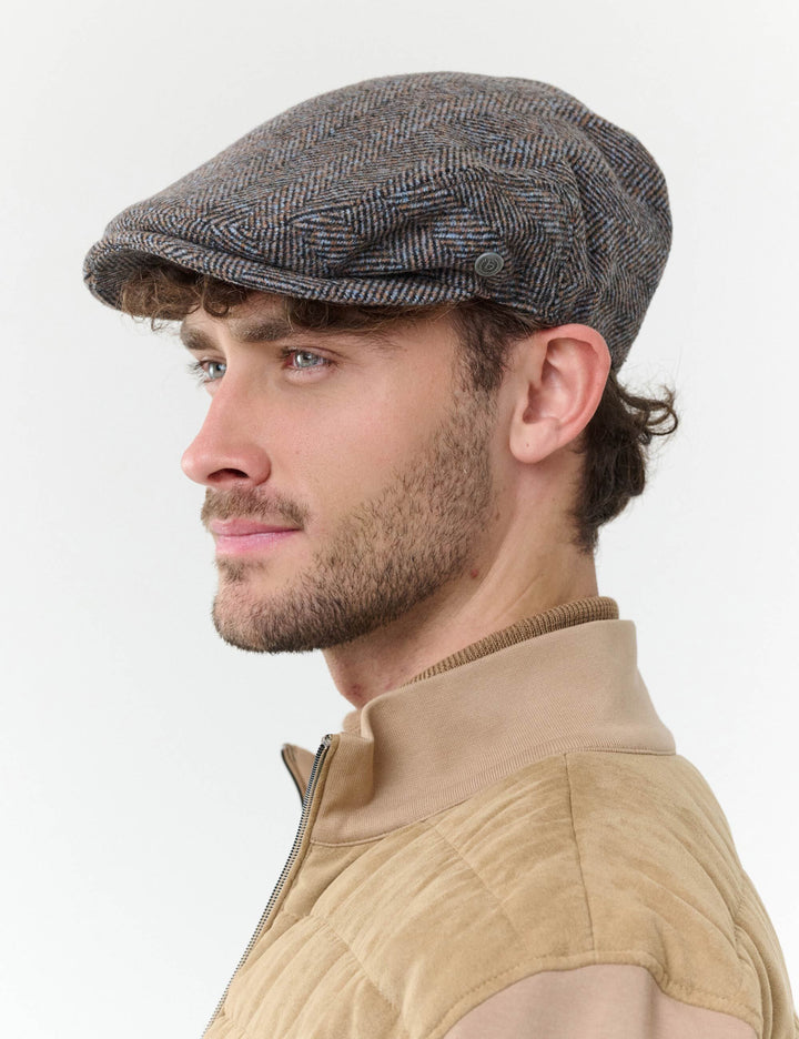 Melierte bugatti Flatcap mit Fischgrät-Design in Wollmischung