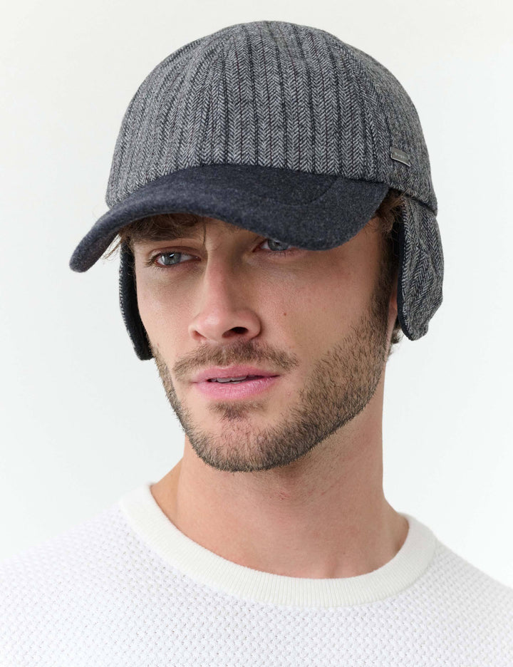 Winddichte bugatti Basecap mit Fischgrät-Design und Ohrenklappen