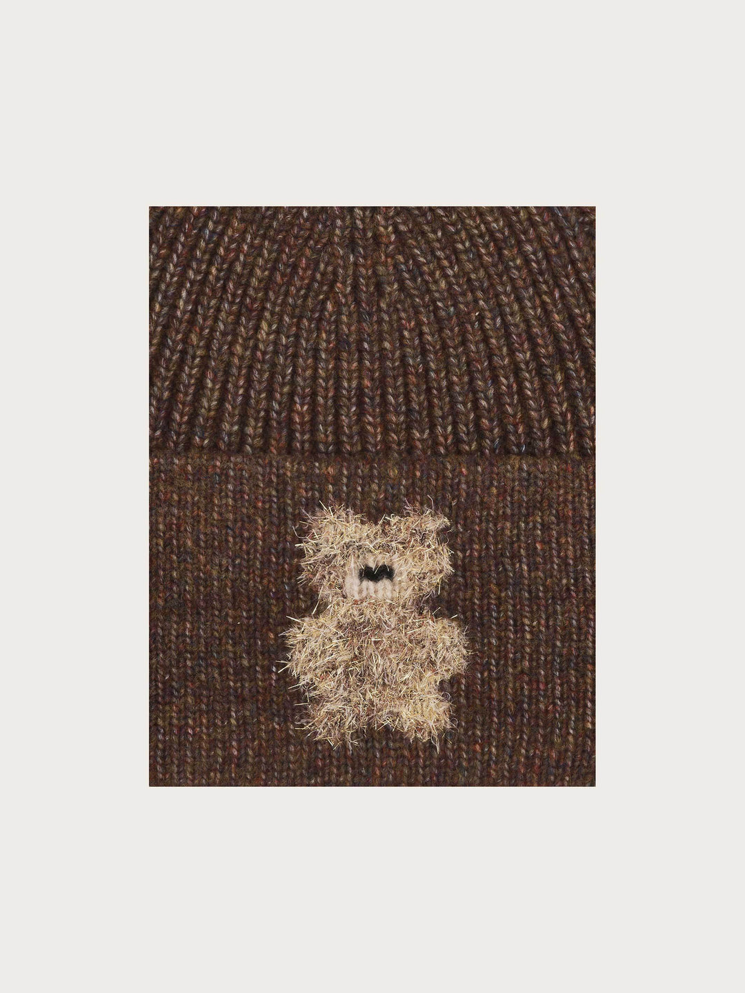Strickmütze mit golden glitzerndem Teddy