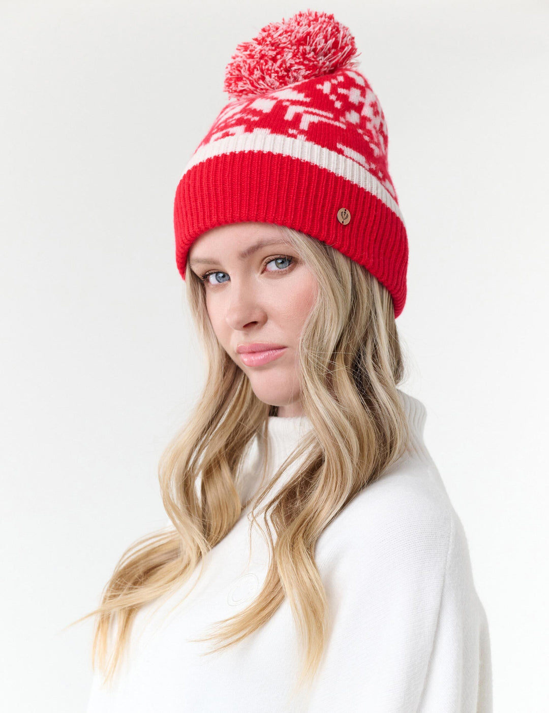Strickmütze mit Sternen-Muster und Bommel aus reiner Wolle
