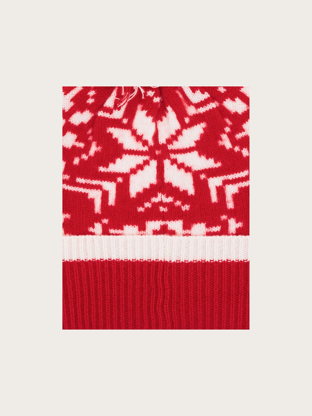 Strickmütze mit Sternen-Muster und Bommel aus reiner Wolle