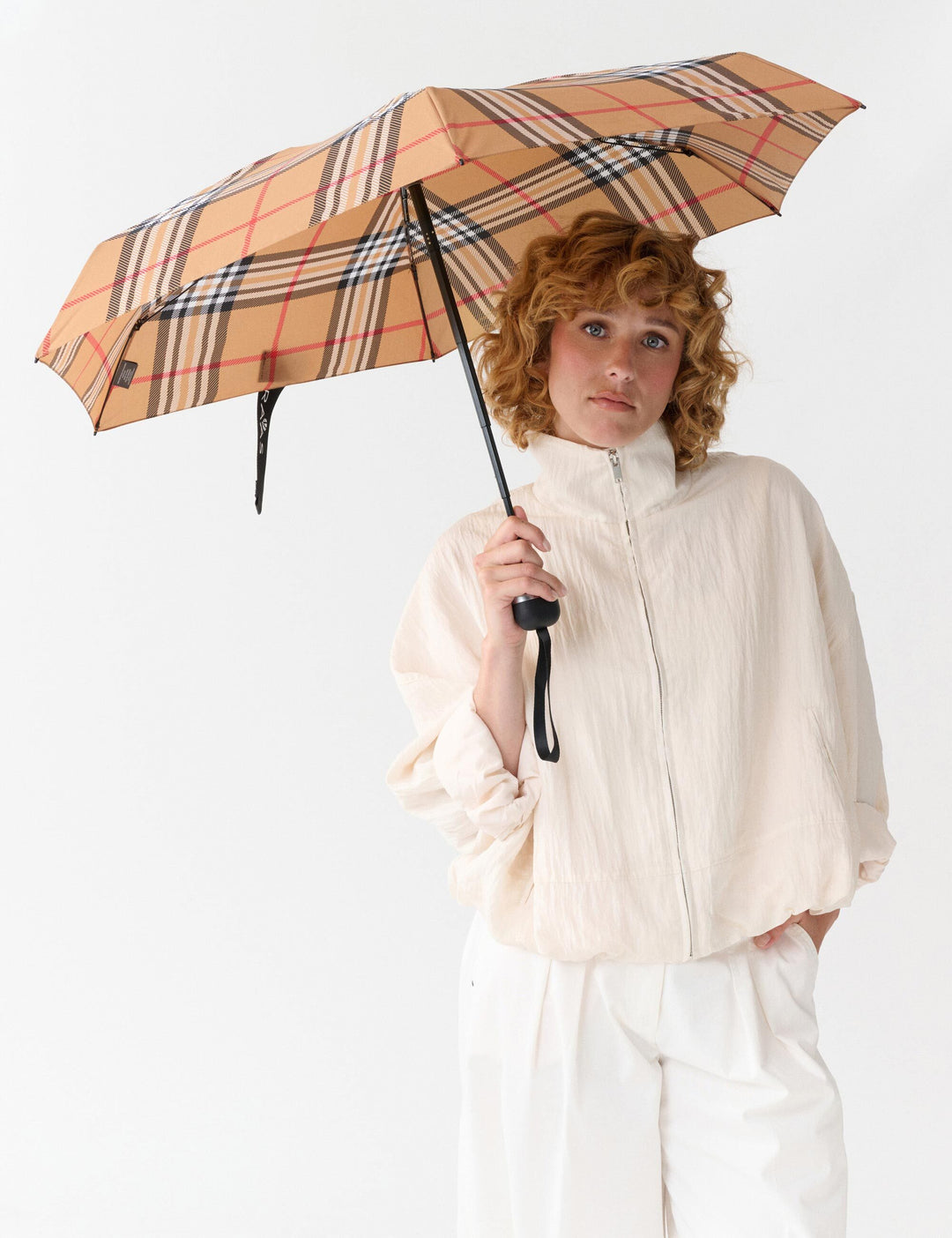 Kompakter Regenschirm mit FRAAS Plaid Karo