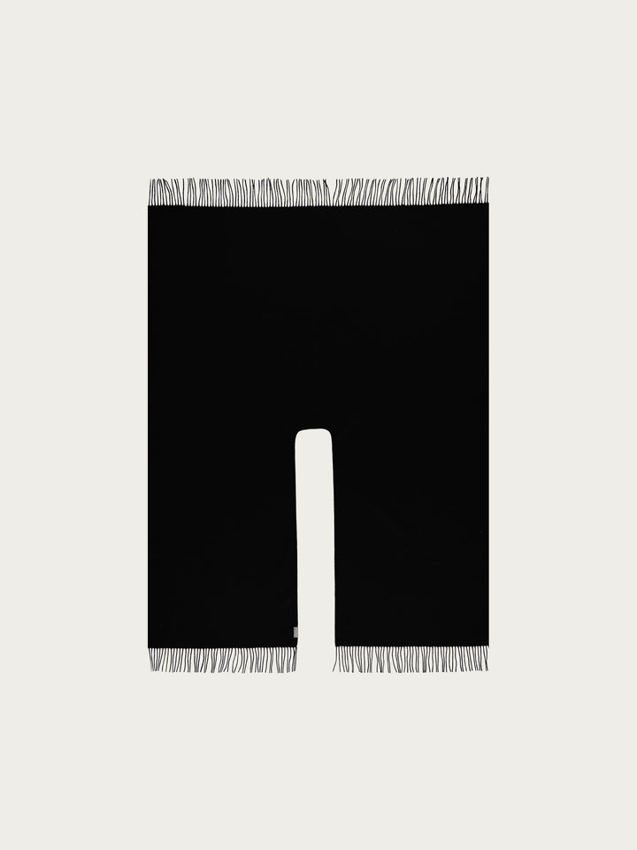 Einfarbiger Poncho aus reiner Wolle