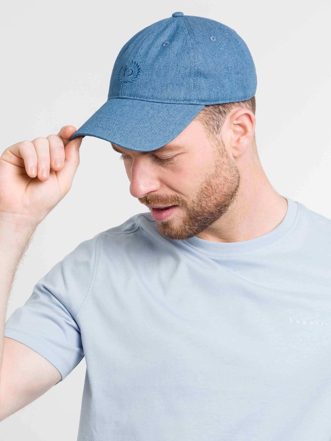 Einfarbige Baseballkappe im Jeans-Look mit gesticktem bugatti-Logo