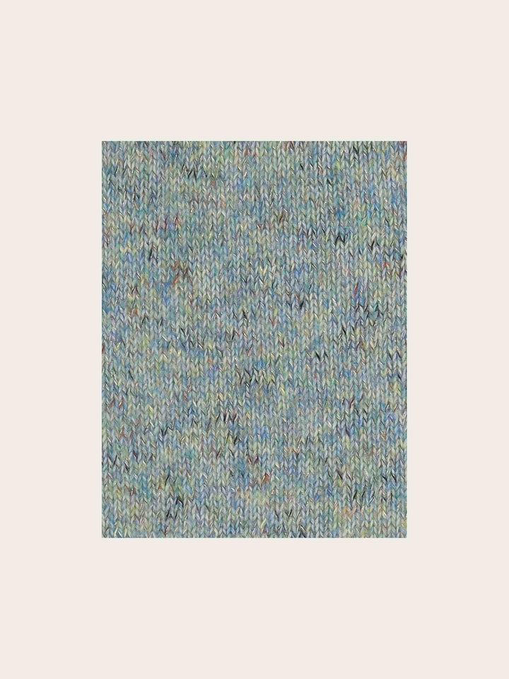 Melierter Strickschal mit Glitzer im Bias Cut