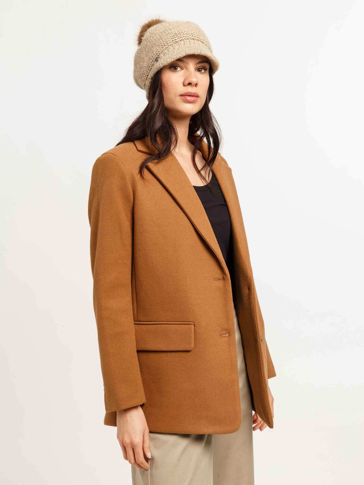 Gestrickte Loevenich Ballonmütze mit Kunstfellbommel