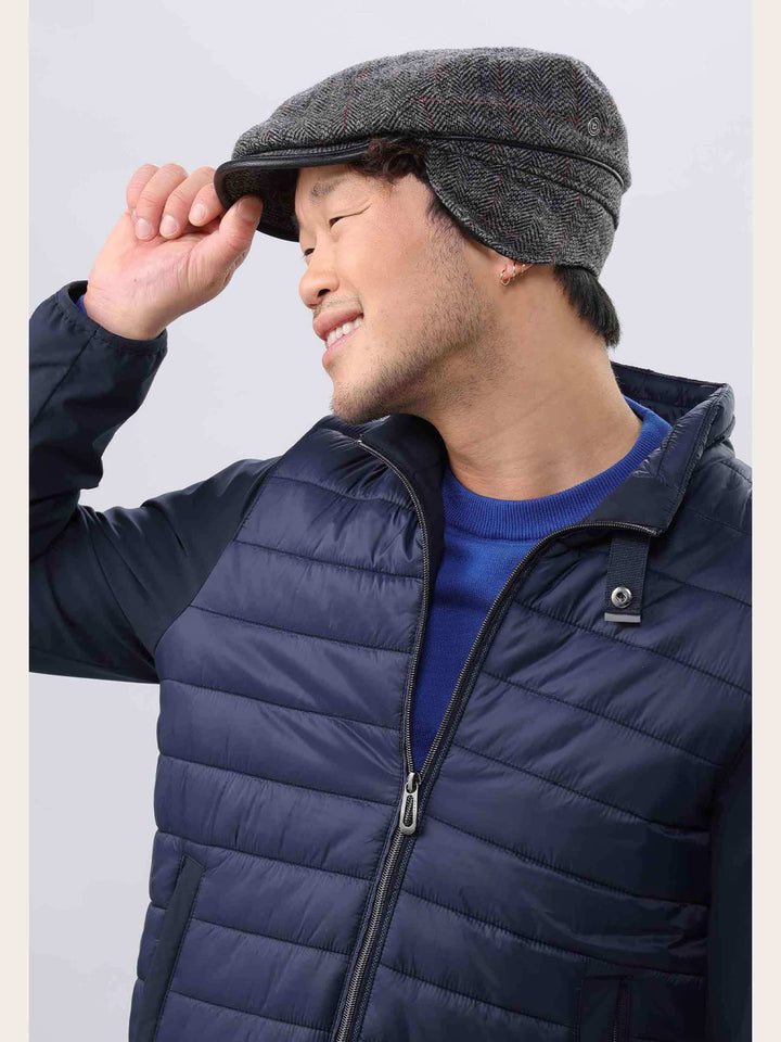 Einfarbige winddichte und wetterabweisende bugatti Flatcap mit Ohrenklappen