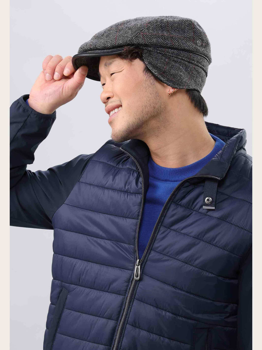 Einfarbige winddichte und wetterabweisende bugatti Flatcap mit Ohrenklappen