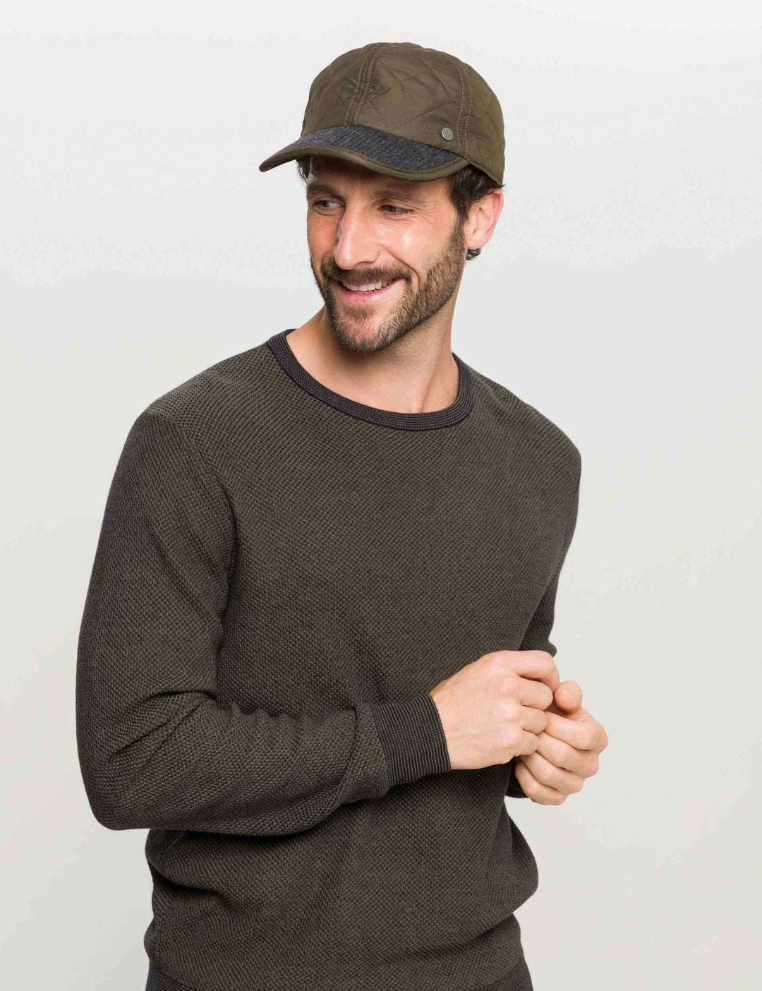 Einfarbige bugatti Puffer-Basecap mit Ohrenklappen