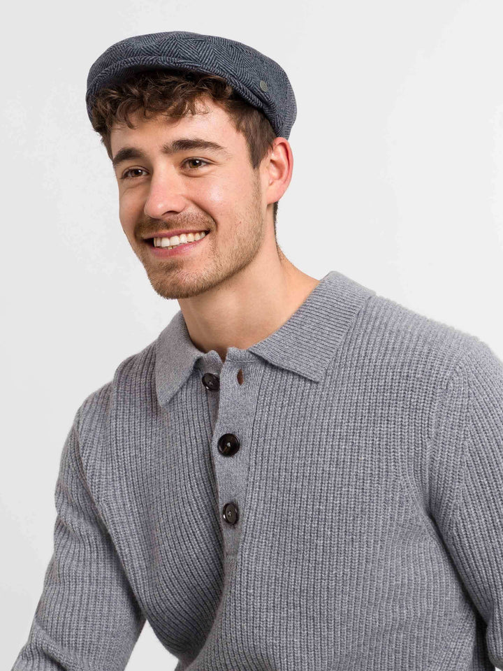 Einfarbige melierte bugatti Flatcap mit Fischgrat-Design