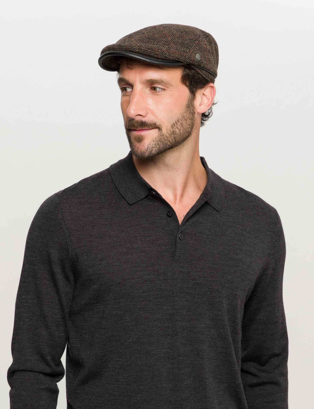 Einfarbige winddichte und wetterabweisende bugatti Flatcap mit Ohrenklappen