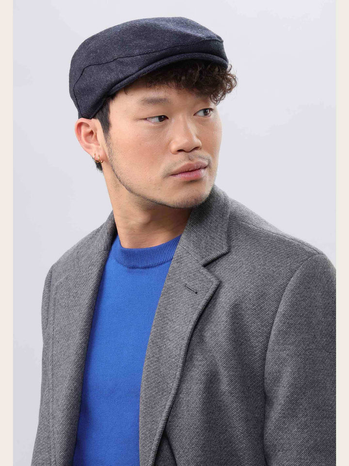 Einfarbige bugatti Flatcap mit Fischgrat-Design
