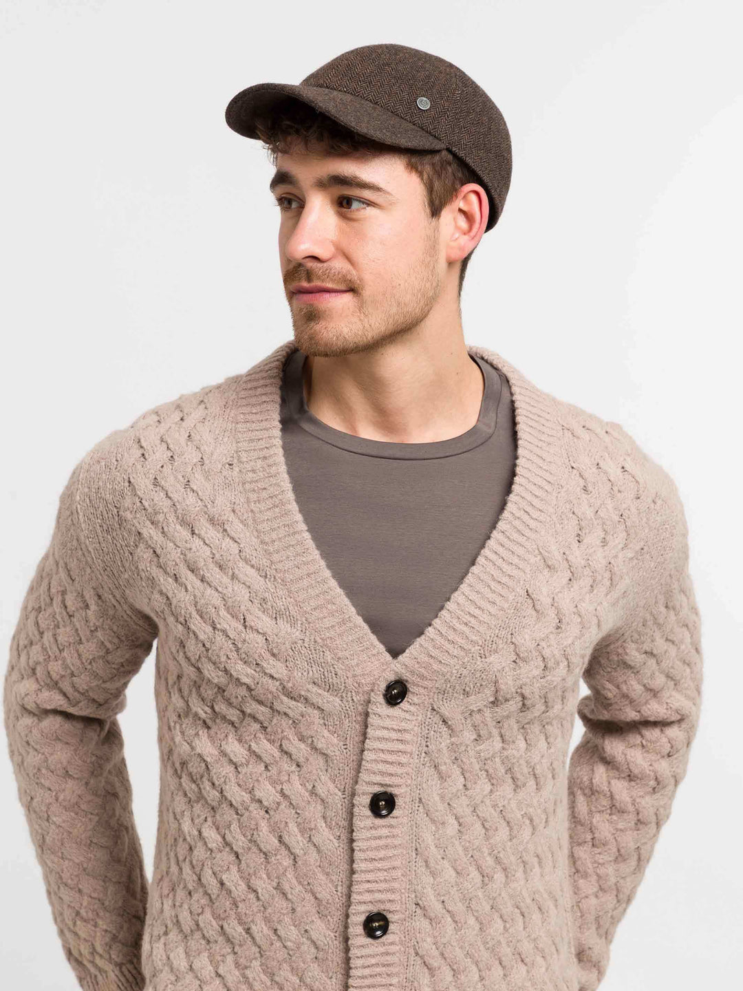 Wetterabweisende bugatti Flatcap mit Fischgrat-Design und Ohrenklappen