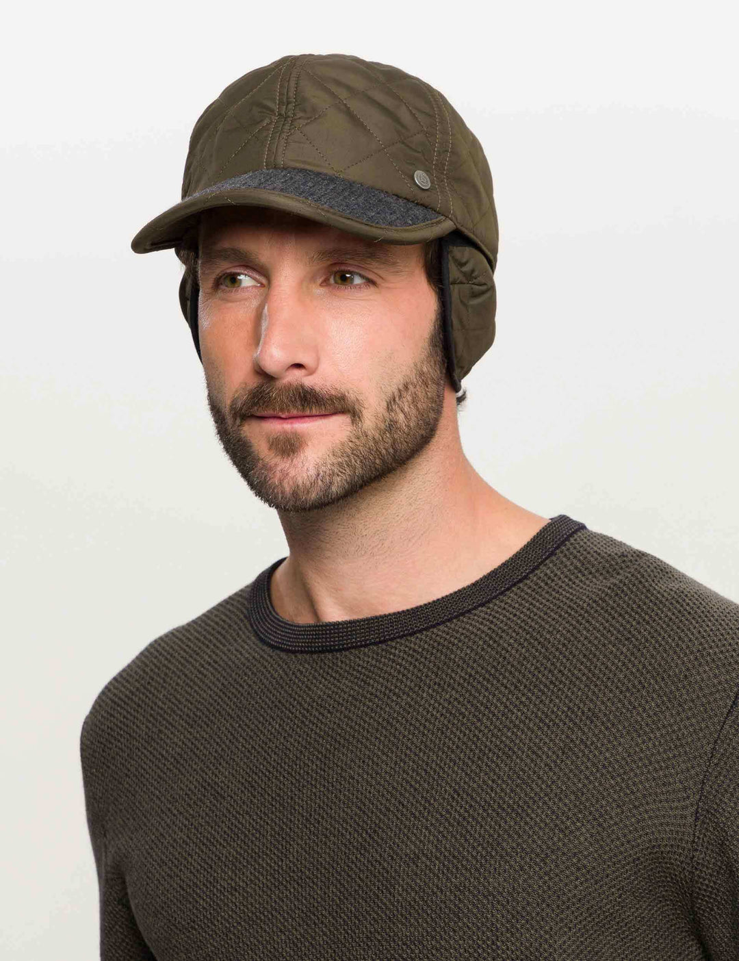 Einfarbige bugatti Puffer-Basecap mit Ohrenklappen