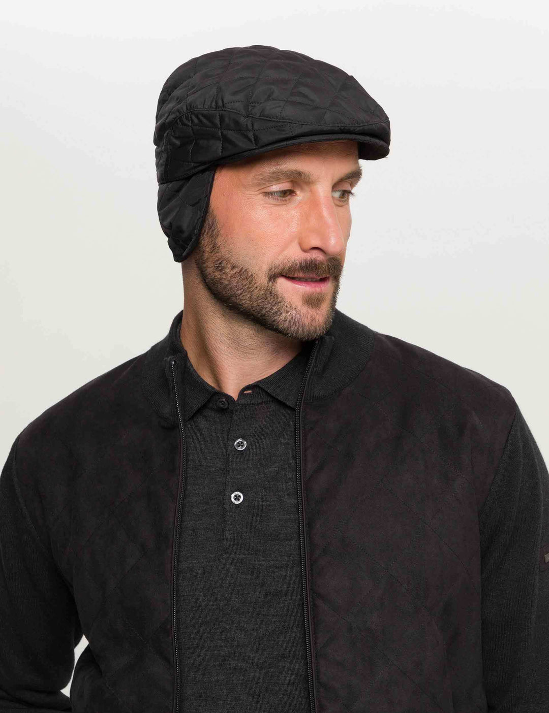 Einfarbige wetterabweisende bugatti Puffer-Flatcap mit Ohrenklappen