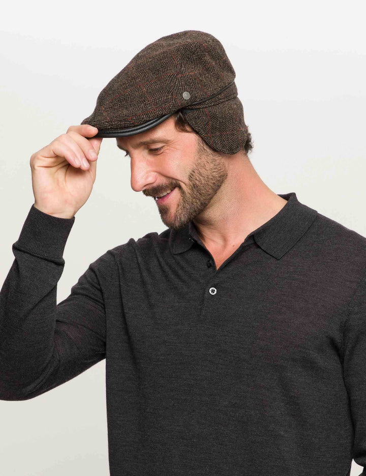 Einfarbige winddichte und wetterabweisende bugatti Flatcap mit Ohrenklappen