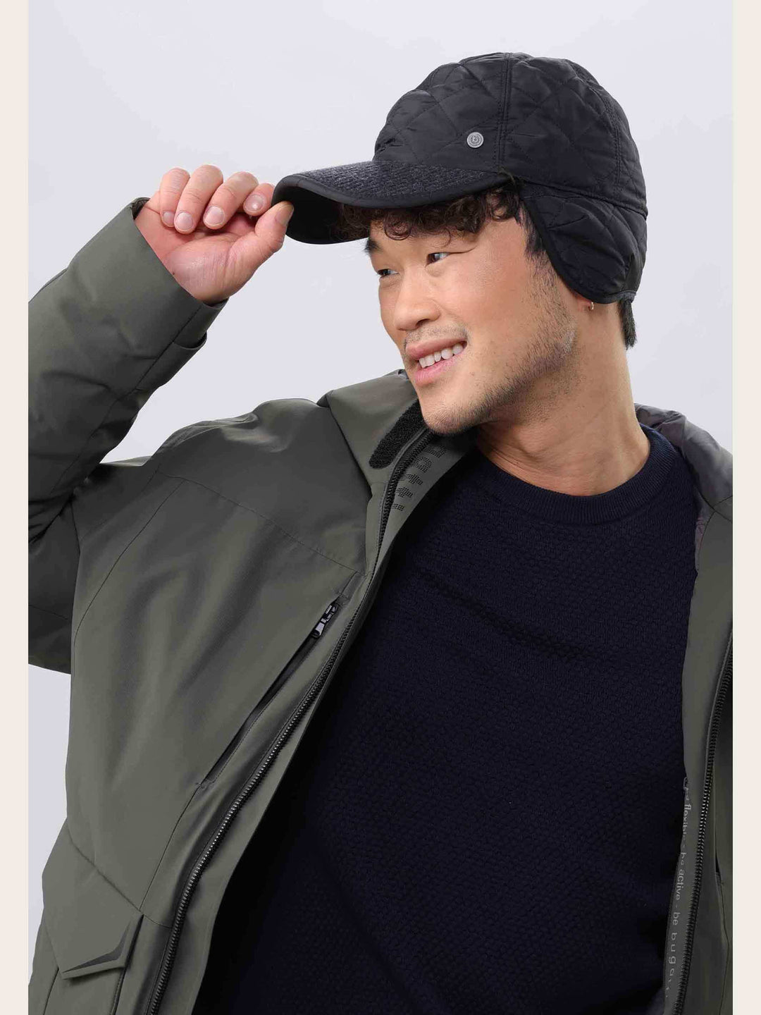 Einfarbige bugatti Puffer-Basecap mit Ohrenklappen