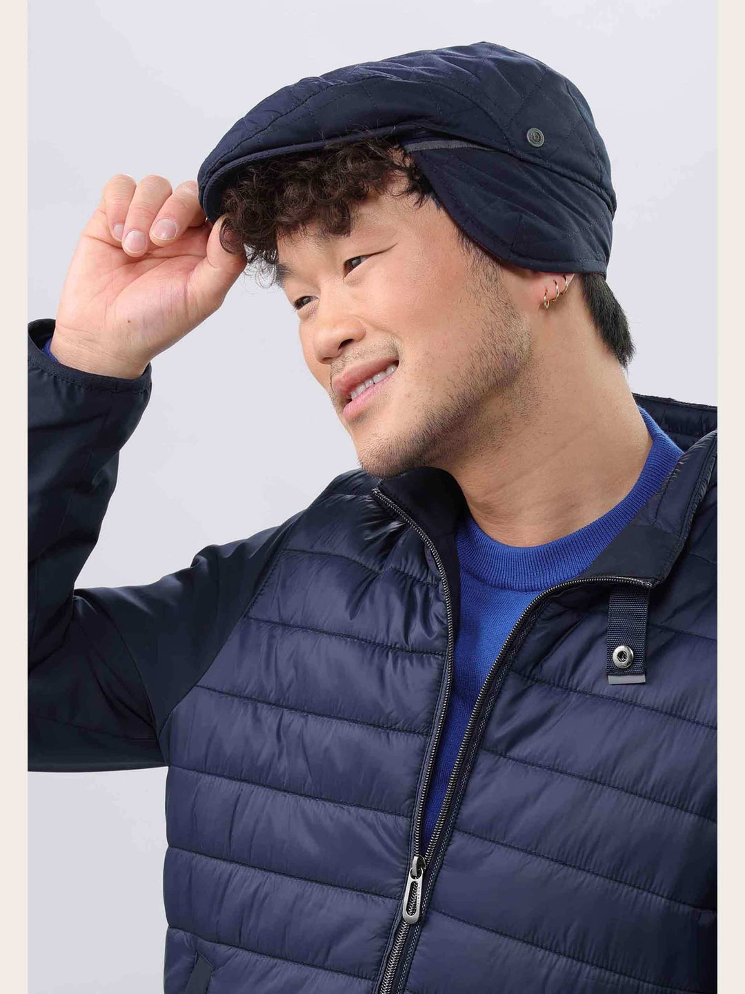 Einfarbige wetterabweisende bugatti Puffer-Flatcap mit Ohrenklappen