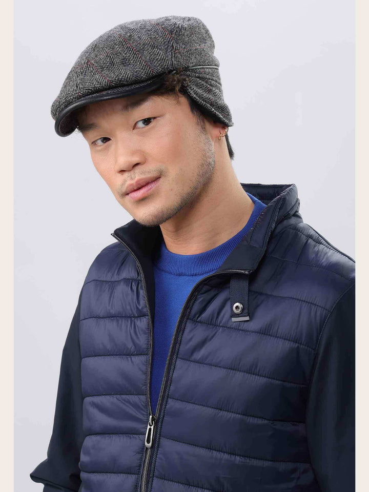 Einfarbige winddichte und wetterabweisende bugatti Flatcap mit Ohrenklappen