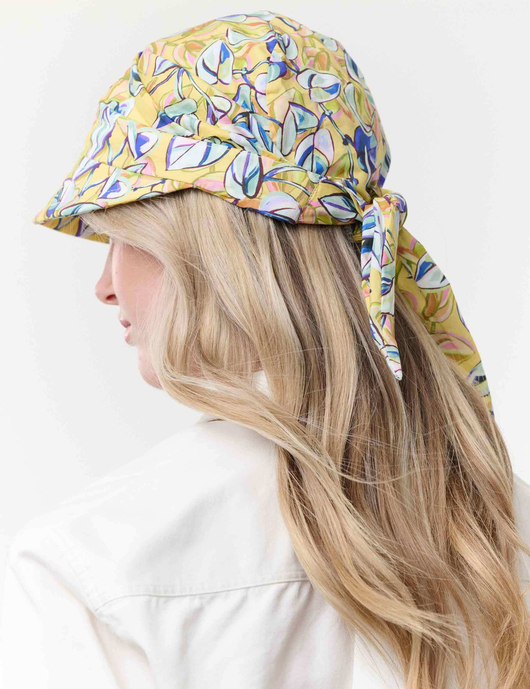 Loevenich Kappe zum Binden mit buntem Blätter-Print