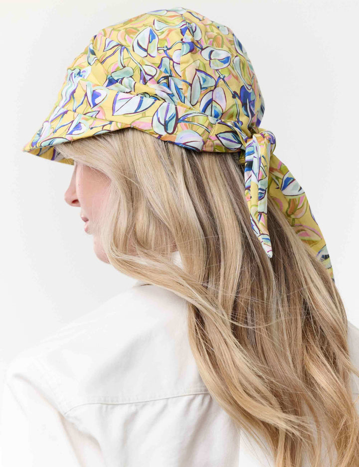 Loevenich Kappe zum Binden mit buntem Blätter-Print